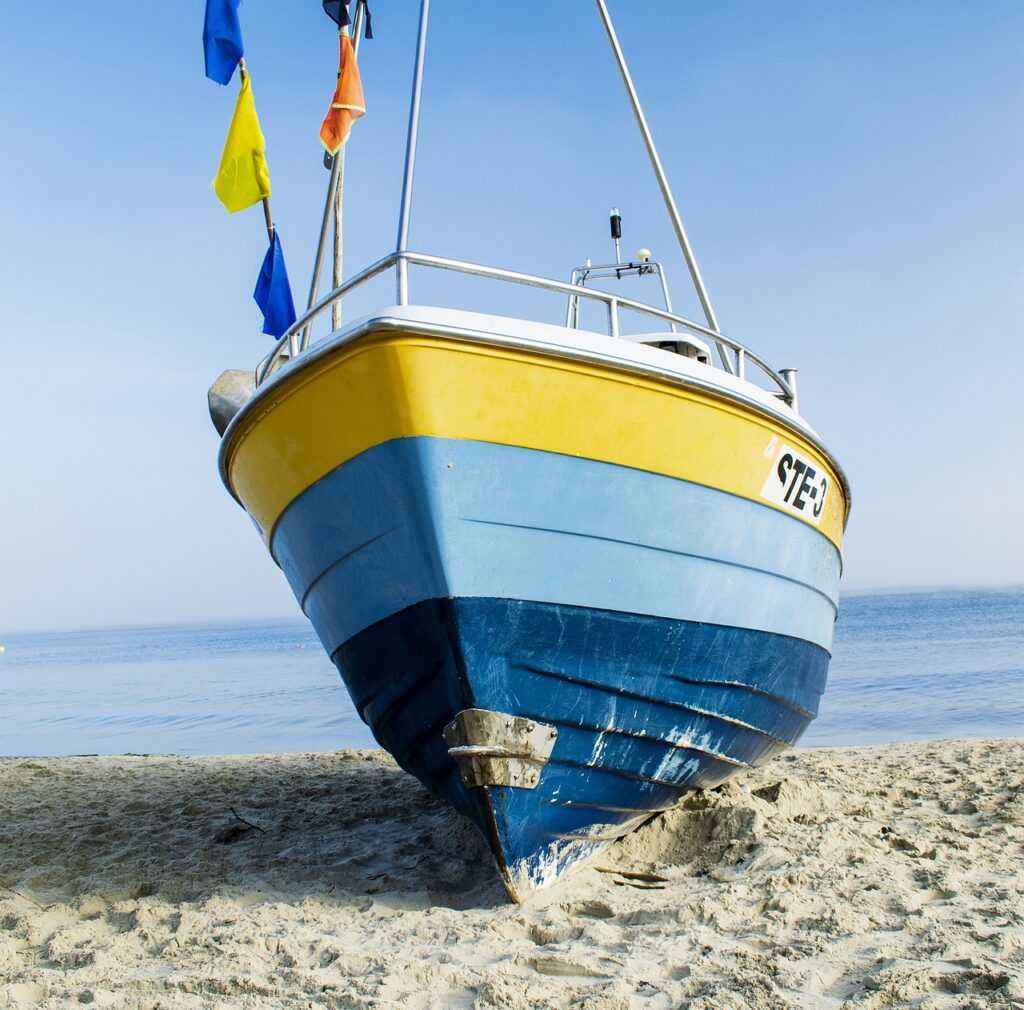 boat docked on the beach