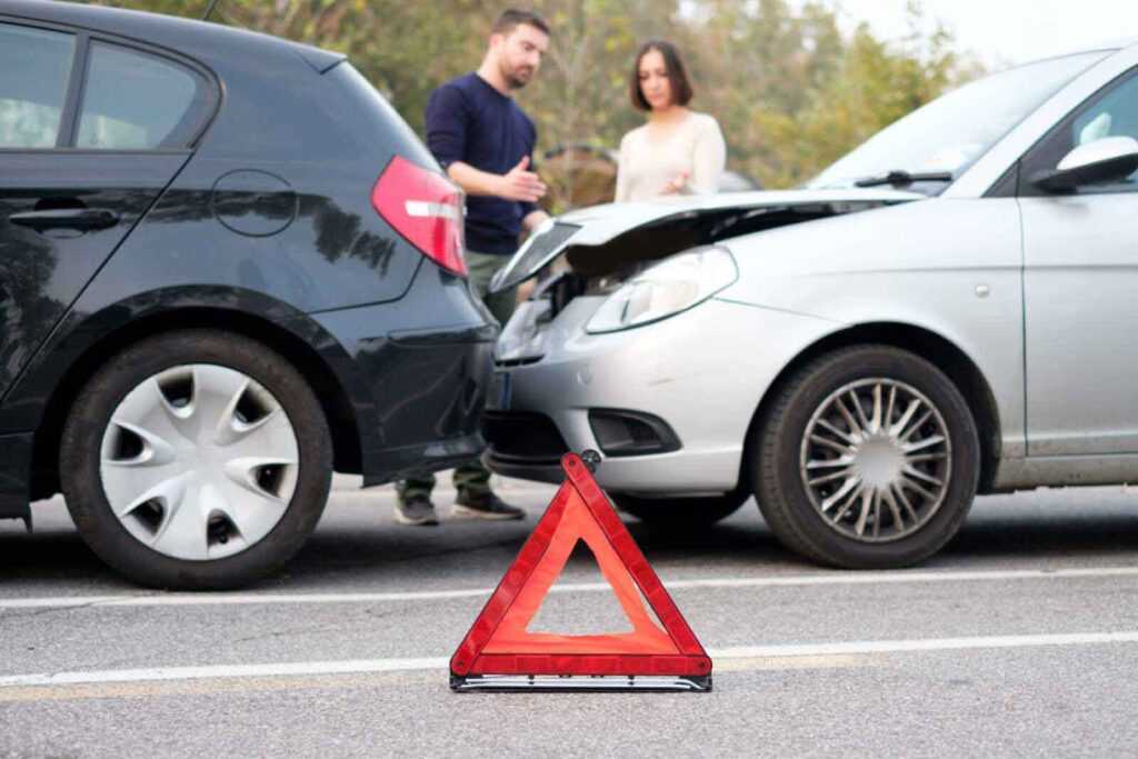 People checking car damages after car accident